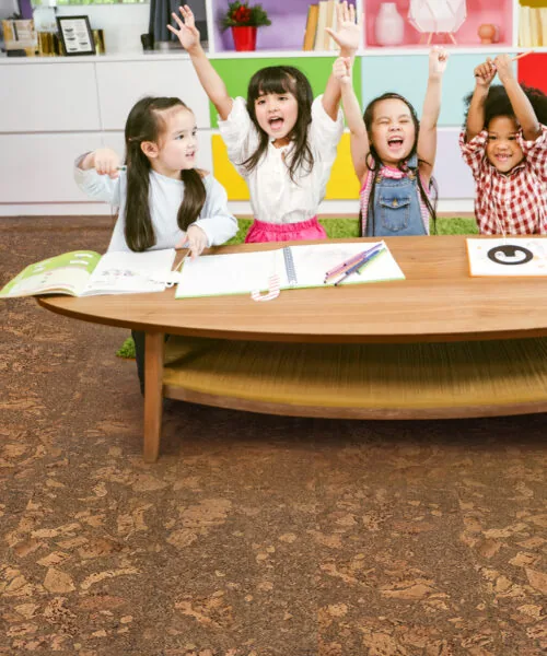 tasmanian burl cork flooring at daycare center happy children play on