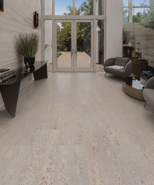 Umber Grey - 7/16" (11mm) - Swiss Real Cork Floating (FUG11) Luxury hallway featuring Umber Grey Swiss Real Cork Floating Flooring with a soft natural cork texture and sophisticated modern décor.