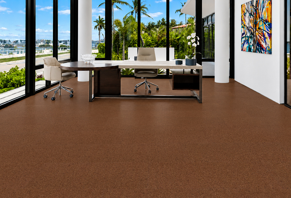Venetian - 25/64" (10mm) - Cork Floating (FVen10) Venetian 10mm quiet cork flooring in warm brown grounds a tropical-view office with an executive desk.