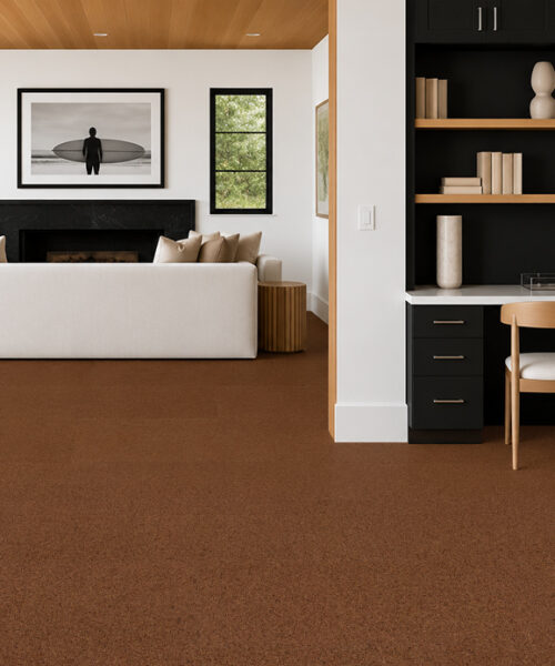Venetian - 25/64" (10mm) - Cork Floating (FVen10) Warm-brown Venetian floating cork flooring flows seamlessly between a fireplace lounge and compact built-in workspace.