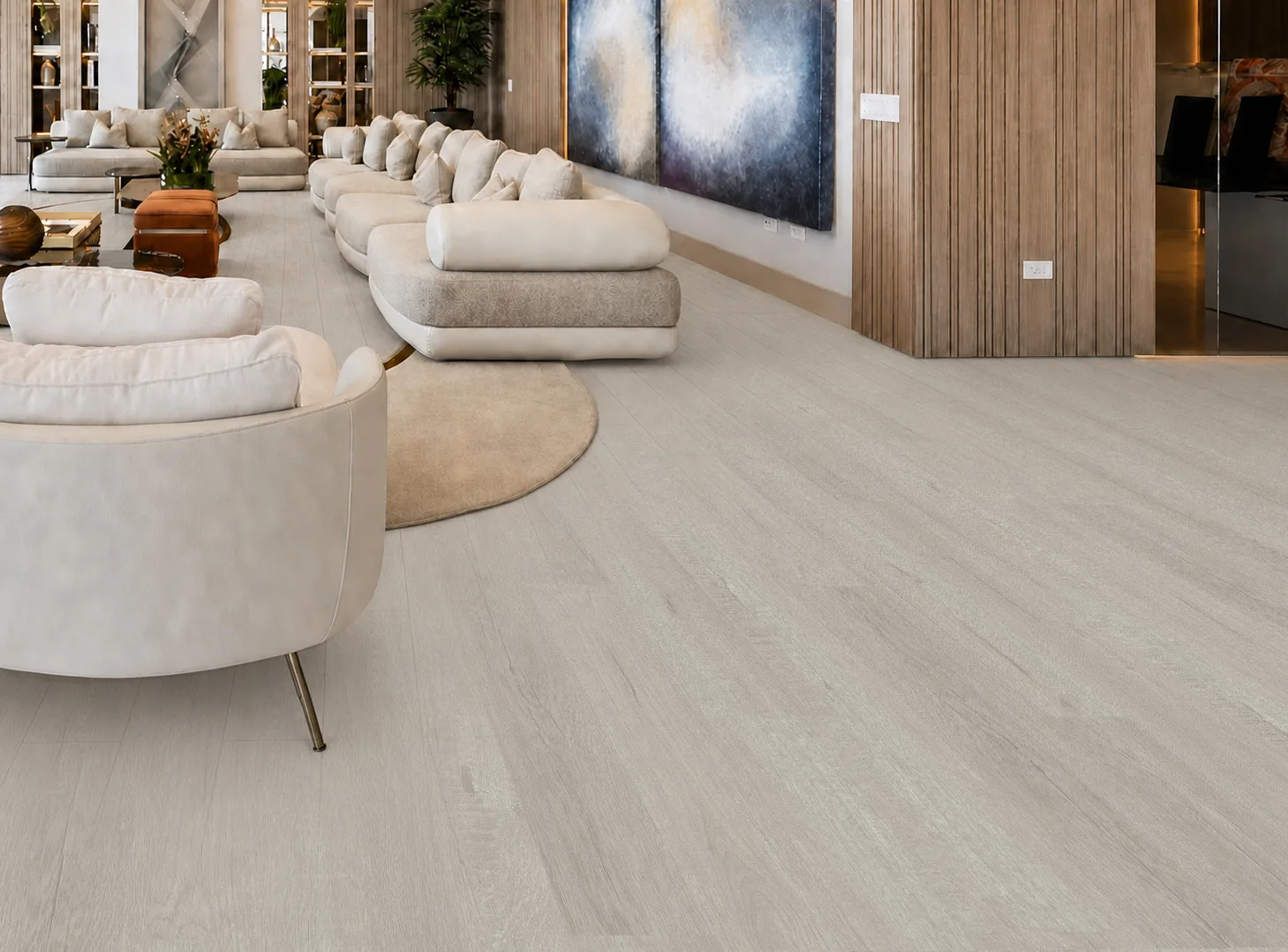 Light Grey Oak - 13/32" (10.5mm) - Design Cork Floating (FLG10.5) Elegant living room with light grey oak floating floor, curved seating, and wood paneling