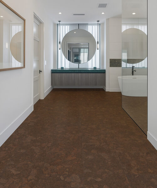 Moisture-resistant Walnut Burlwood cork floating floor showcased in a contemporary bathroom vanity area.