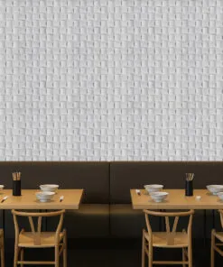 Restaurant interior with Wave Wood 3D acoustic cork wall panels, displaying white woven pattern that enhances ambience, reduces noise, and adds modern texture
