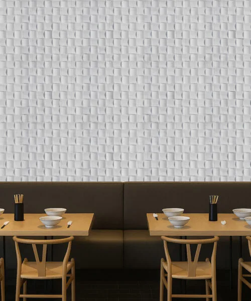 Restaurant interior with Wave Wood 3D acoustic cork wall panels, displaying white woven pattern that enhances ambience, reduces noise, and adds modern texture