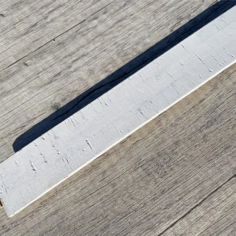 White bamboo cork flooring t molding transition threshold.