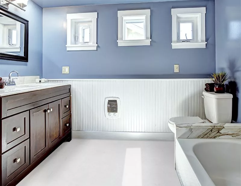 white leather cork tiles in beautiful lavender bathroom with vanity cabinet with drawers and mirror white bath tub