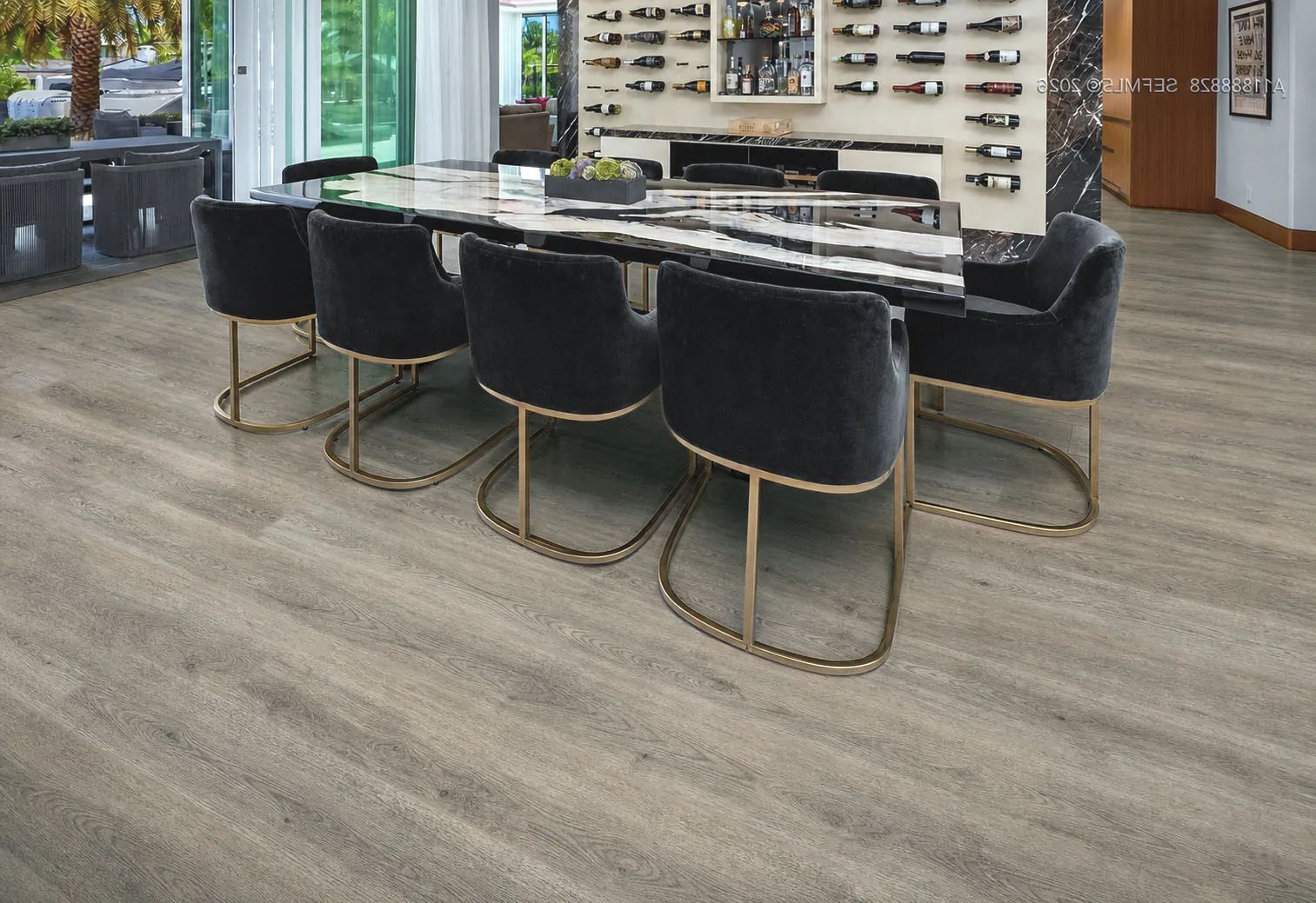 Wild Oak - 13/32" (10.5mm) - Design Cork Floating (FWO10.5) Elegant dining and wine room with gray wood-grain cork flooring and dark velvet chairs.