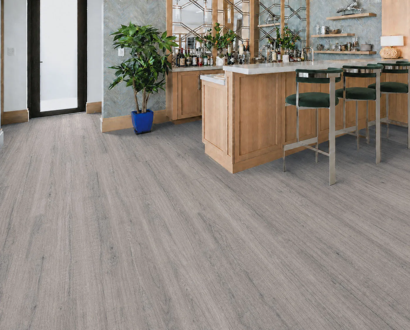 Wild Oak - 13/32" (10.5mm) - Design Cork Floating (FWO10.5) Contemporary home bar featuring medium-gray wood-grain cork flooring and natural wood cabinetry.
