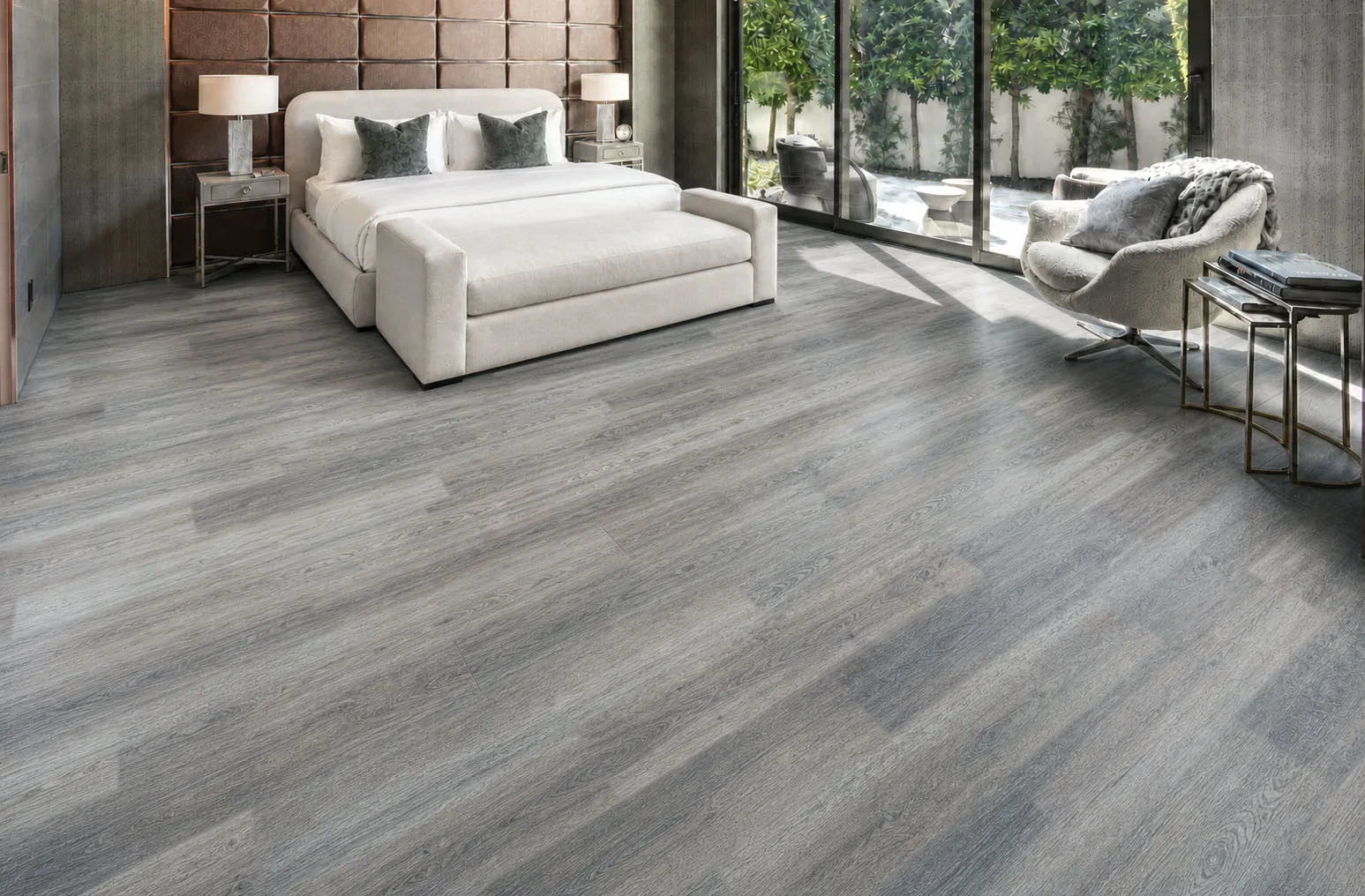 Wild Oak - 13/32" (10.5mm) - Design Cork Floating (FWO10.5) Sunlit contemporary bedroom with textured gray oak-look cork plank flooring.