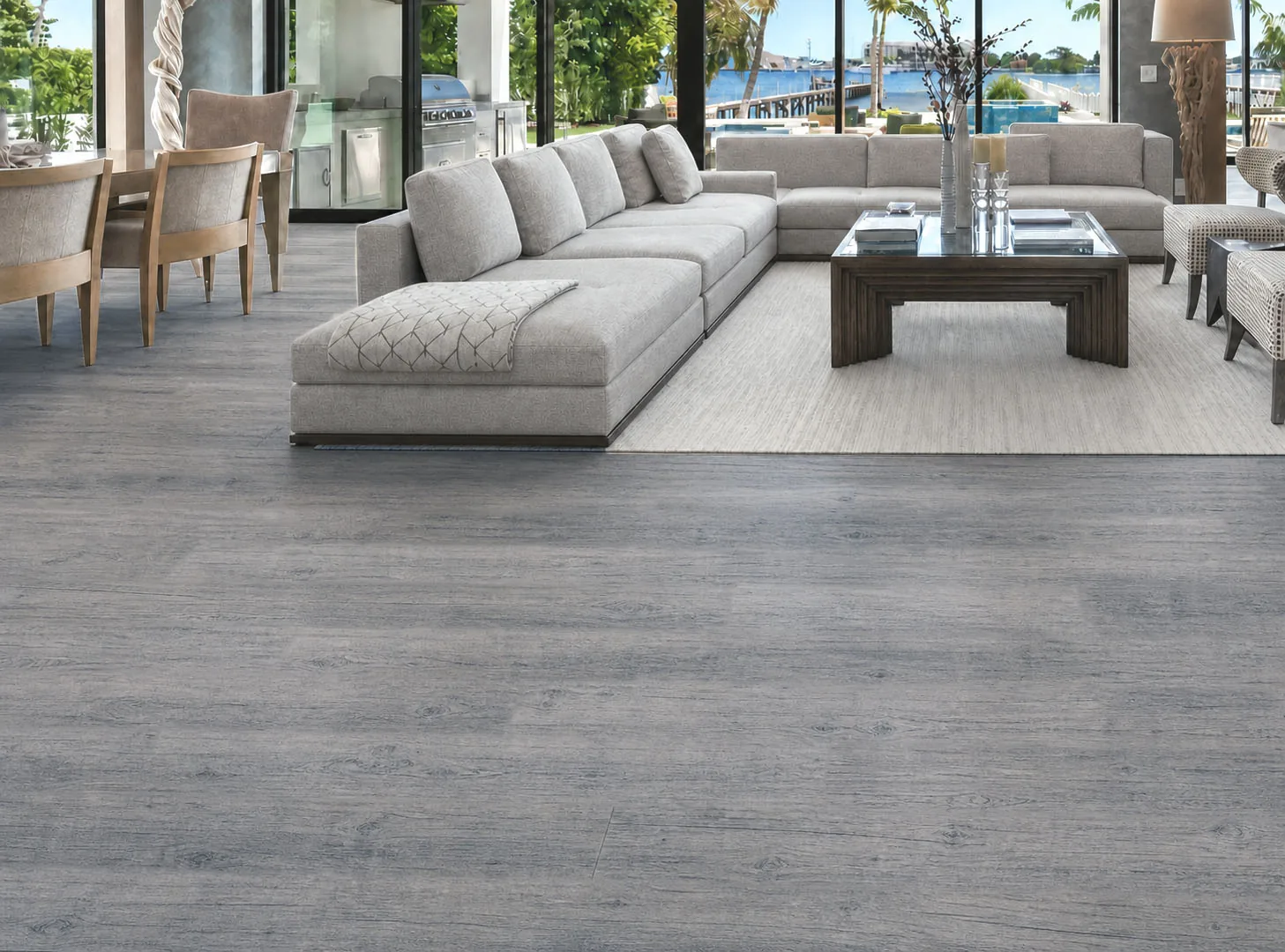 Wild Oak - 13/32" (10.5mm) - Design Cork Floating (FWO10.5) Spacious coastal living room featuring wide-plank gray oak-look cork flooring.