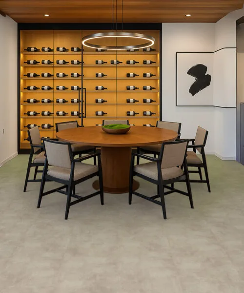 Copperstone Gray - 3/8" (9.5mm) - Forna Natural Composite Flooring with Waterproof Hydrowood Core (NCopG9.5) Modern bar area with Copperstone Gray waterproof Natural Composite basement flooring, perfect for entertaining.