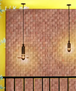 Wood Cubes - 25/64" (10mm) - Cork Wall Tiles (WWoCu10) Textured wood cubes cork wall tiles illuminated by pendant lights, highlighting the natural acoustic properties and decorative depth of 3D cork panels.