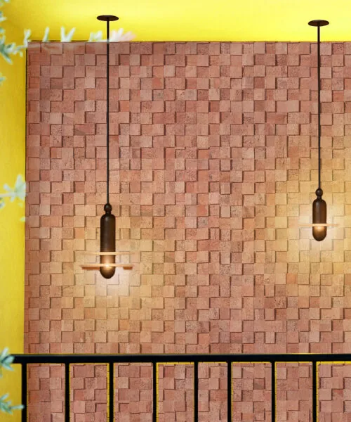 Wood Cubes - 25/64" (10mm) - Cork Wall Tiles (WWoCu10) Textured wood cubes cork wall tiles illuminated by pendant lights, highlighting the natural acoustic properties and decorative depth of 3D cork panels.